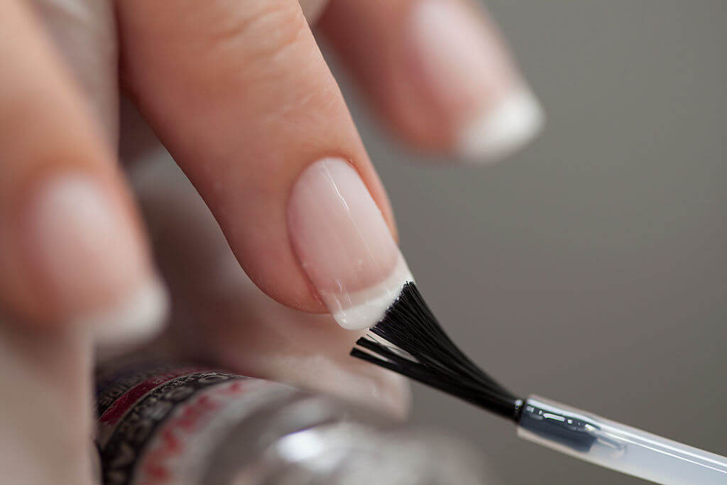 clear nail polish helps keep cracks from spreading