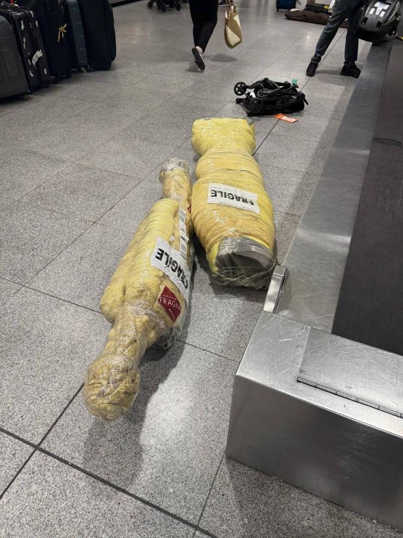 6-foot-long-heavy-strangely-wrapped-fragile-packages-v0-fp9nvocy02ye1