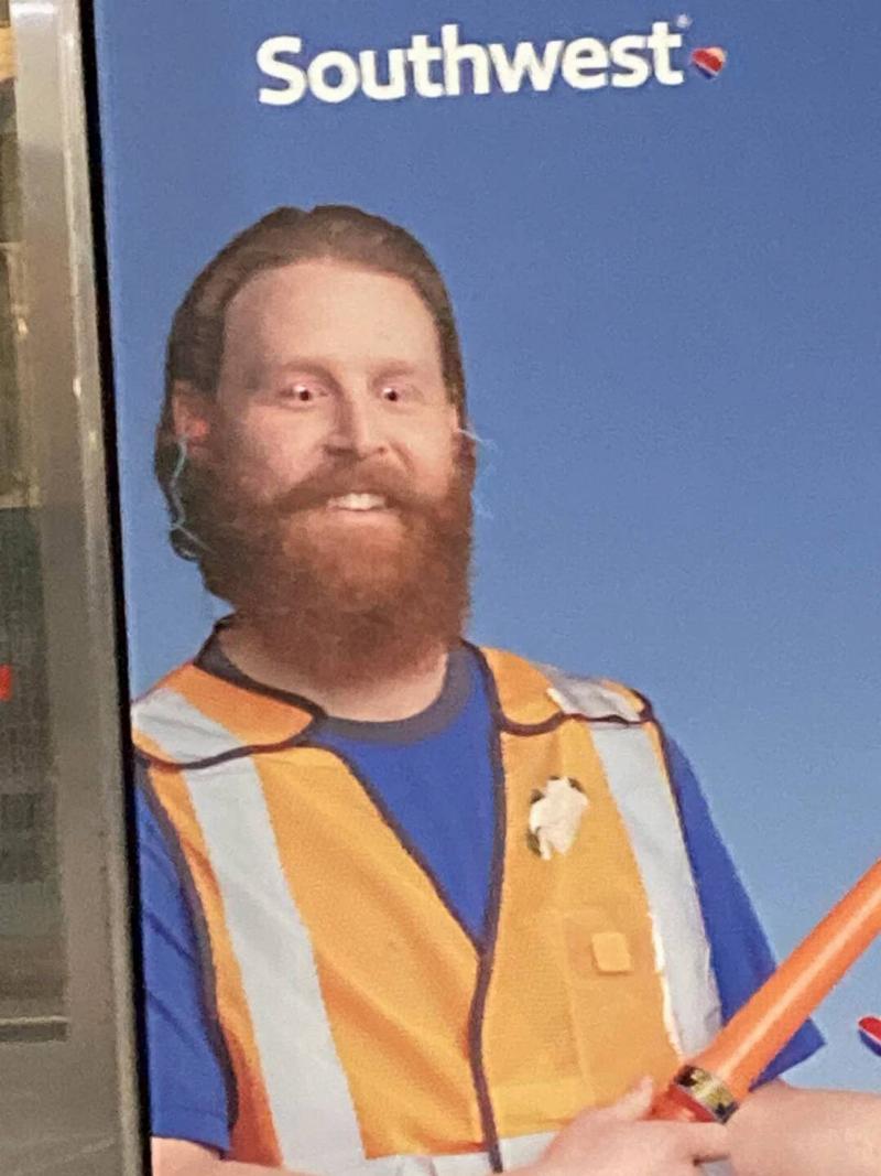 someone-put-googly-eyes-on-this-poster-at-the-airport-v0-3fd9lkfaie6b1