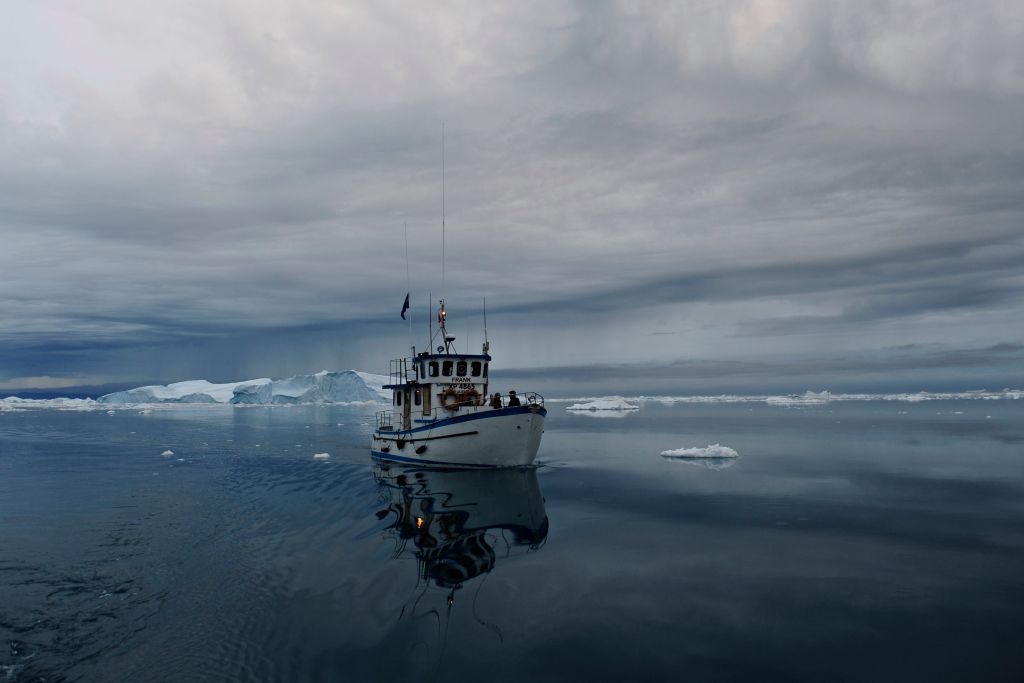 chasing glaciers in dangerous conditions to save an animal
