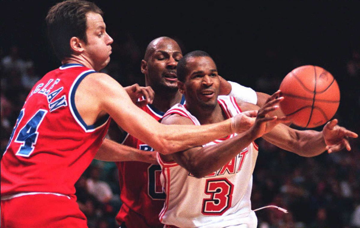 Khalid Reeves(R) of the Miami Heat is swarmed by W