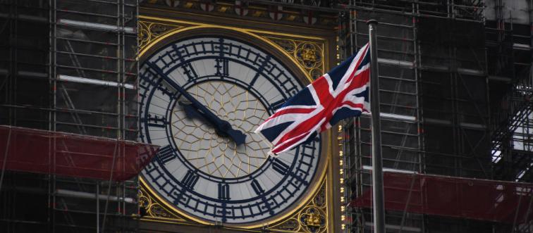 Big Ben In London UK and flag