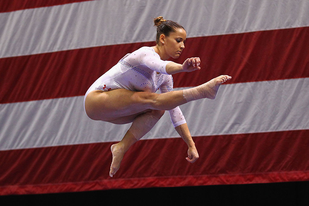 Alicia Sacramone Competes On The Beam 
