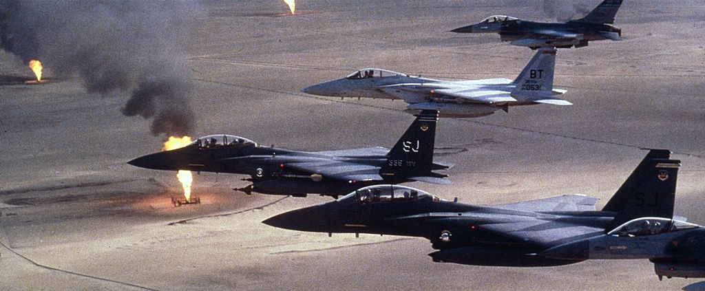 American airforce F-15 C fighters flying over a Kuwaiti oilfield