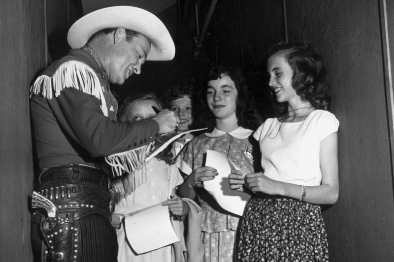 roy rogers signs autographs for young fans