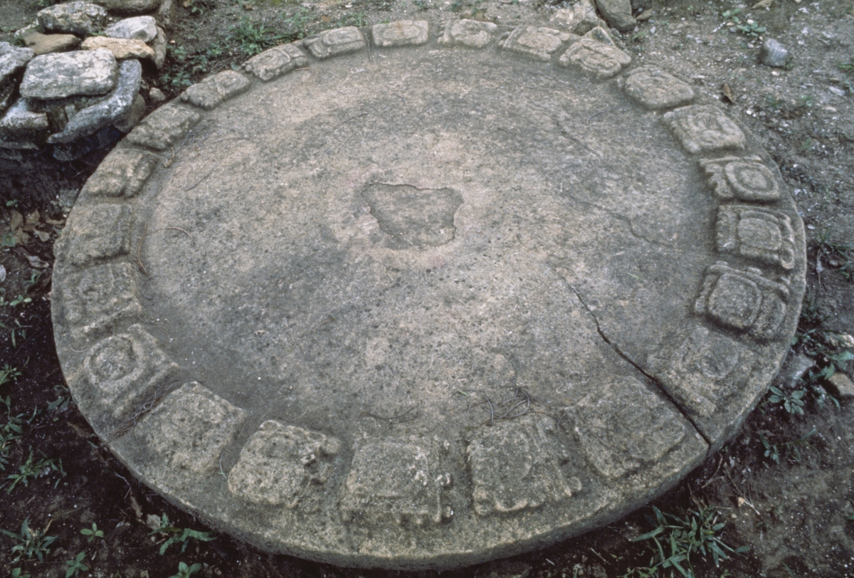 Mayan calendar disk on the ground at Tonina, a pre-Columbian archaeological site in Chiapas, Mexico. 