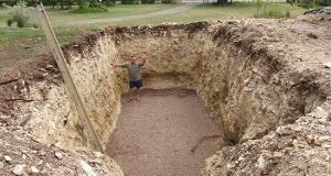 Man Digs Hole In Yard, Becomes The Envy Of His Neighbors, Look Closer At The Hole