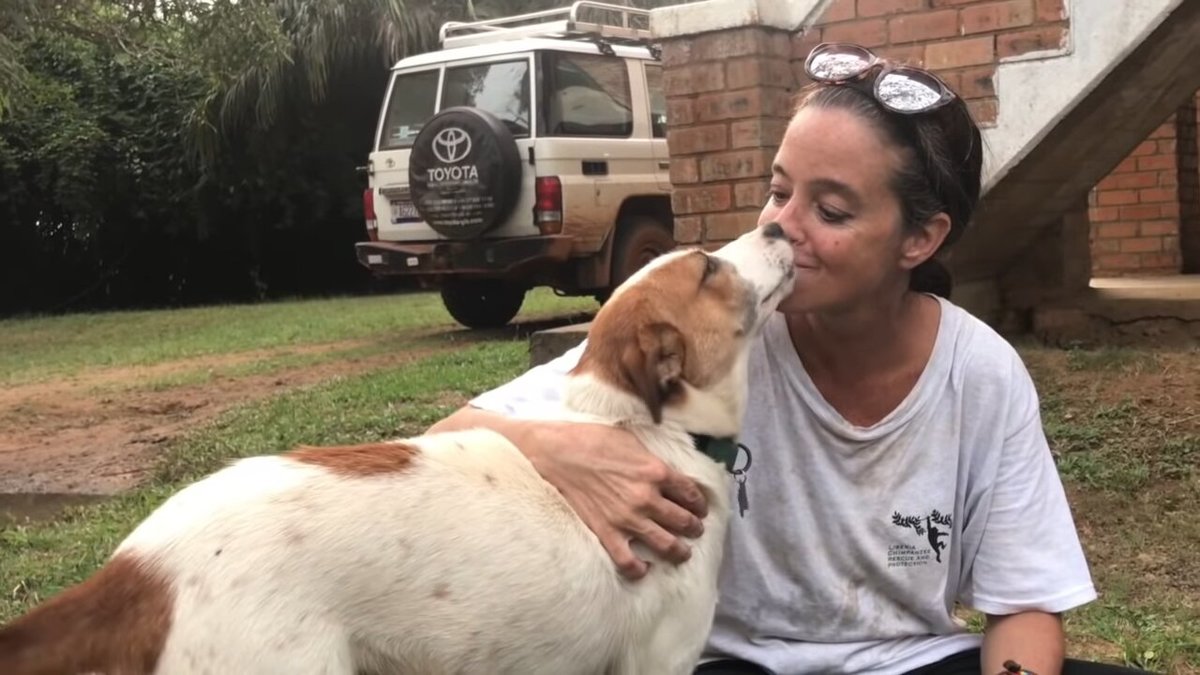 jenny desmond gets a puppy kiss from snafu.