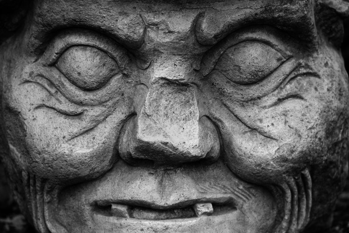 STONE SCULPTURE of MAYAN GOD of MEDECINE & SCIENCE, COPAN RUINS, HONDURAS.