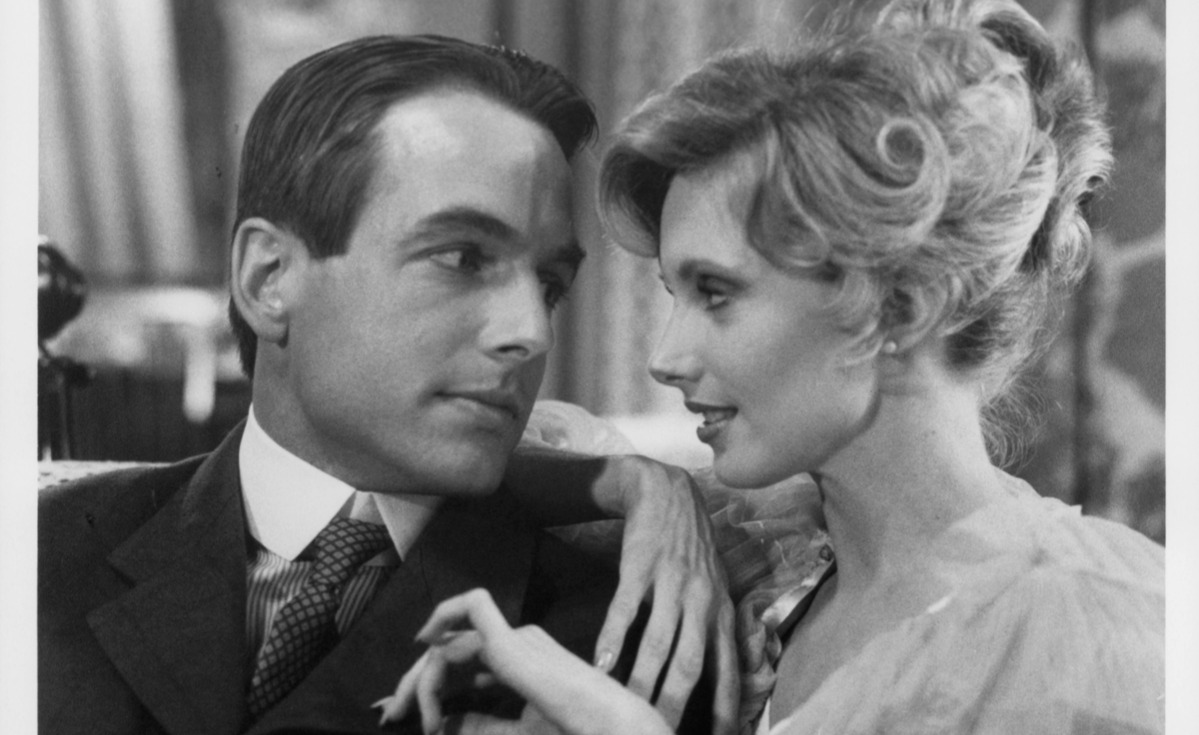 Mark Harmon looking into the eyes of Morgan Fairchild in a scene from the television movie 'The Dream Merchants', 1980 the same year as flamingo road