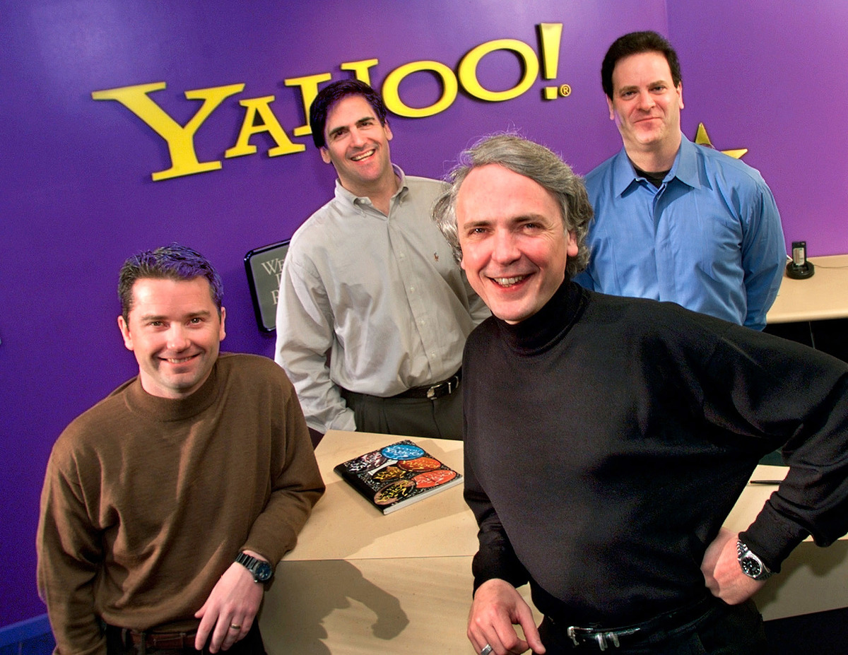 Yahoo! Inc. Executives, Front, Jeff Mallett, President And Coo, And Tim Koogle, Chairman And Ceo, And Broadcast.Com Inc. Executives, Rear, Mark Cuban, President And Chairman, And Todd Wagner Ceo And Vice Chairman