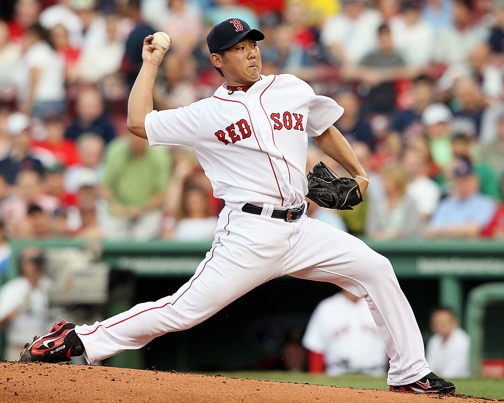 Daisuke Matsuzaka #18 of the Boston Red Sox delivers a pitch in the first inning against the Oakland Athletics on June 2, 2010 at Fenway Park in Boston, Massachusetts-101571107