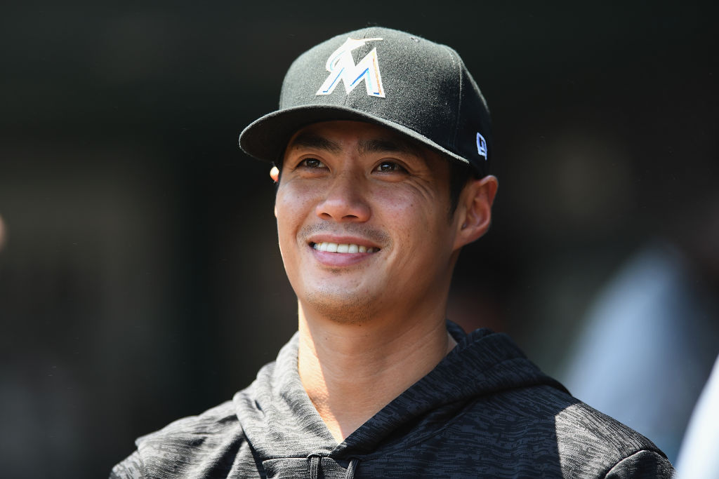 Wei-Yin Chen #54 of the Miami Marlins looks on from the dugout prior to a game against the St. Louis Cardinals at Busch Stadium on June 7, 2018 in St Louis, Missouri-969335412
