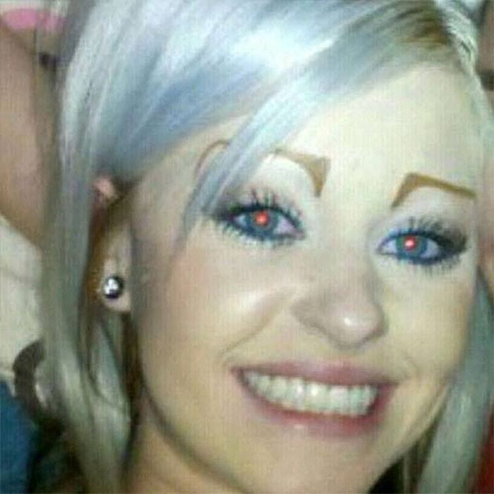 a girl with bad eyebrows
