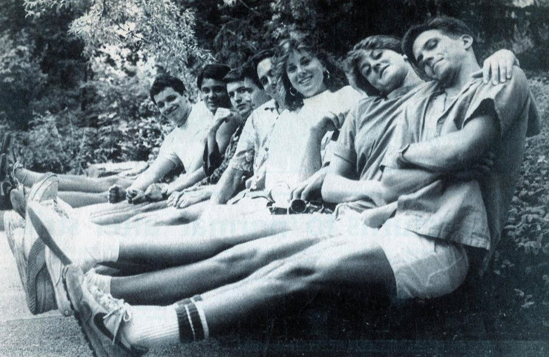 five photo friends with two women in a picture in a newspaper