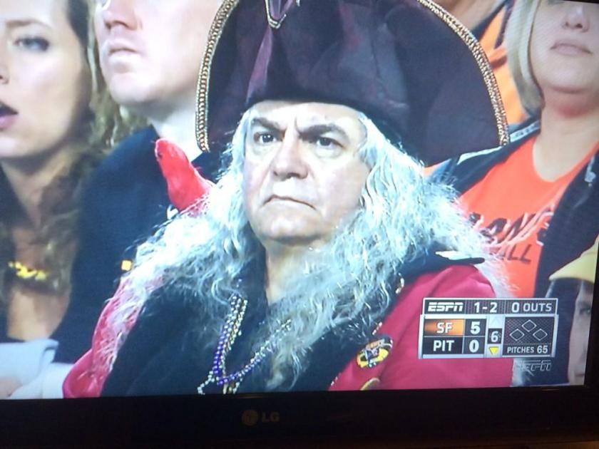 a pirates fan at a baseball game