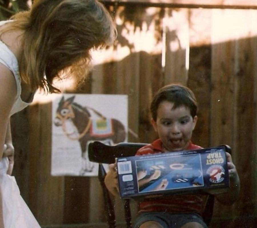 mom and kid with toy happy