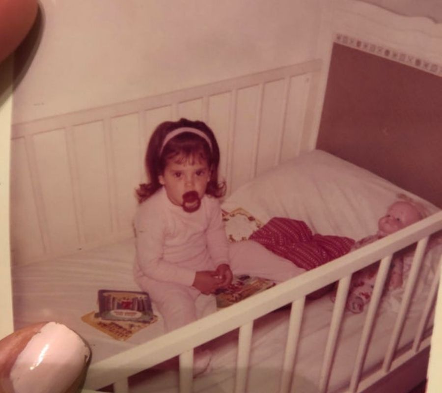 toddler in a crib 