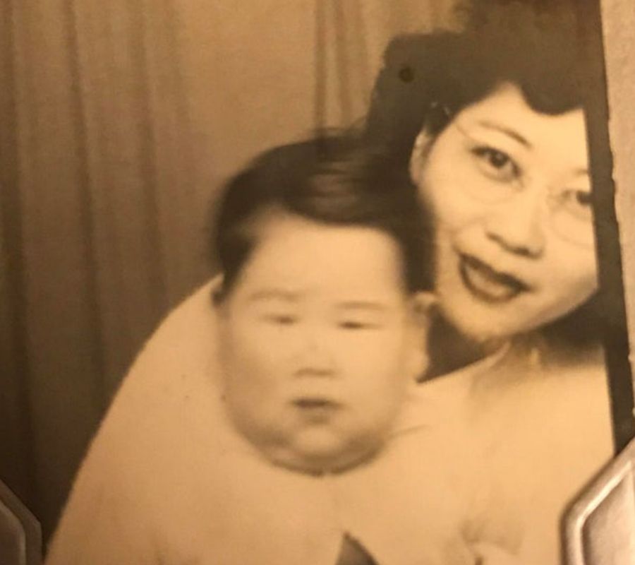 mom and kid posing for photo