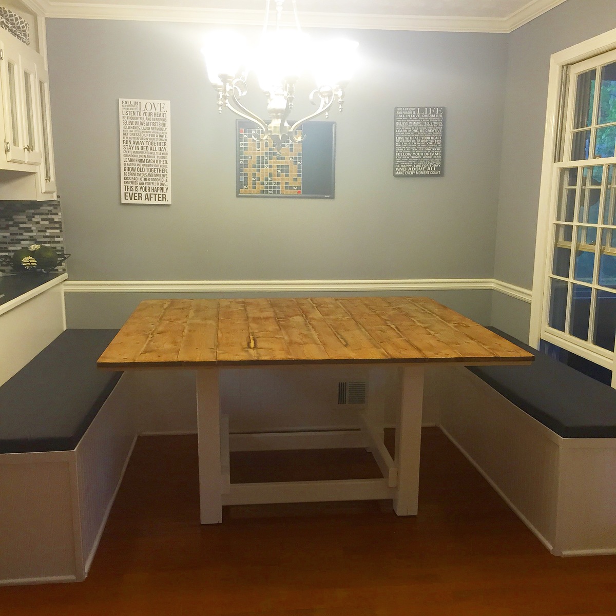 he built a custom table to match the booth