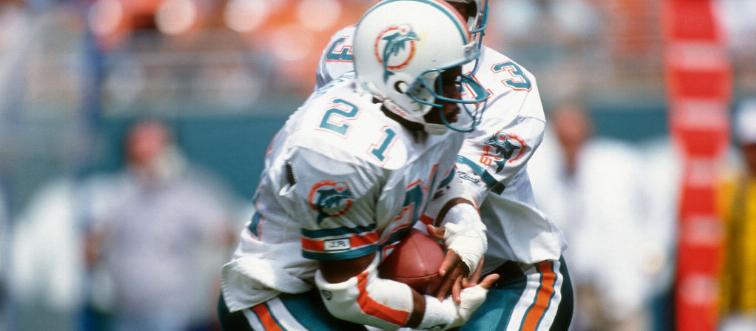 Which 90s coach led the Miami Dolphins to a perfect season in 1972?