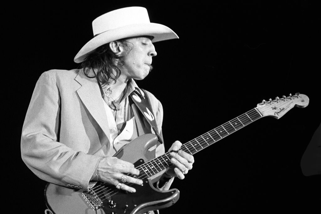 Playing in a cowboy hat 