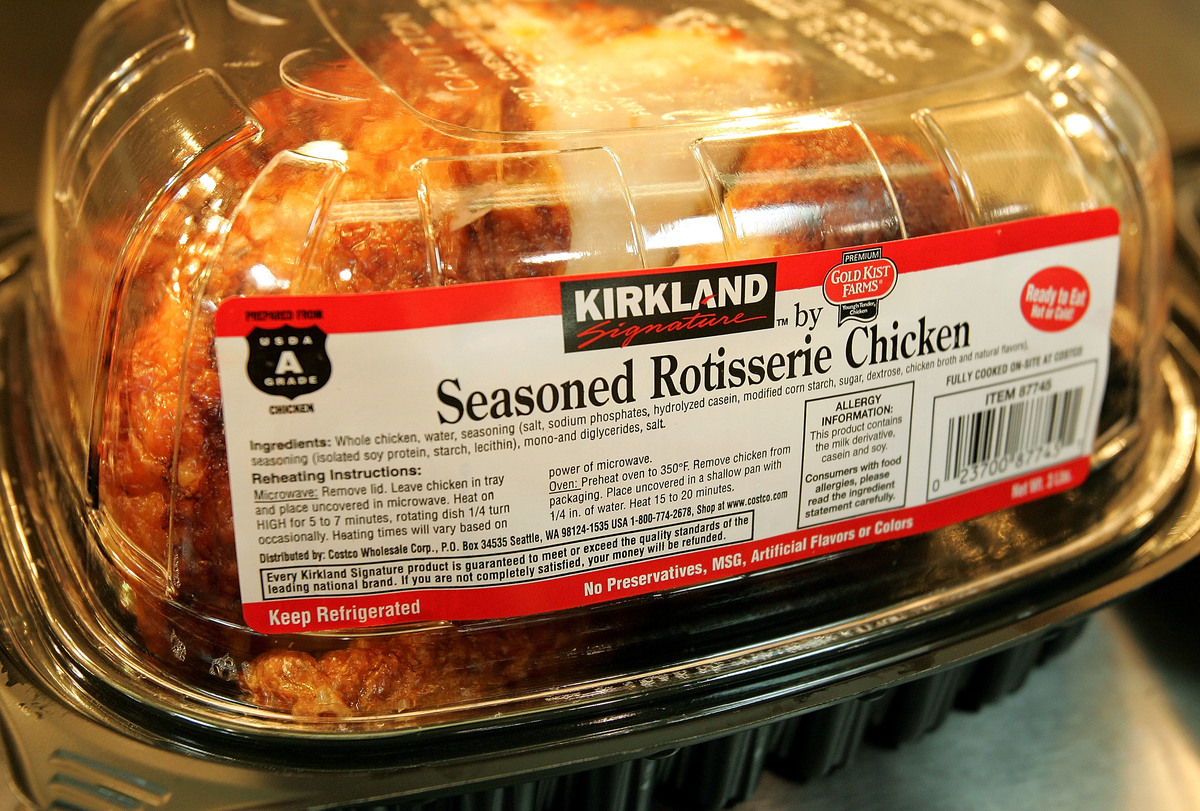 Signature premium brand roasted rotisserie chicken sits at a Costco store
