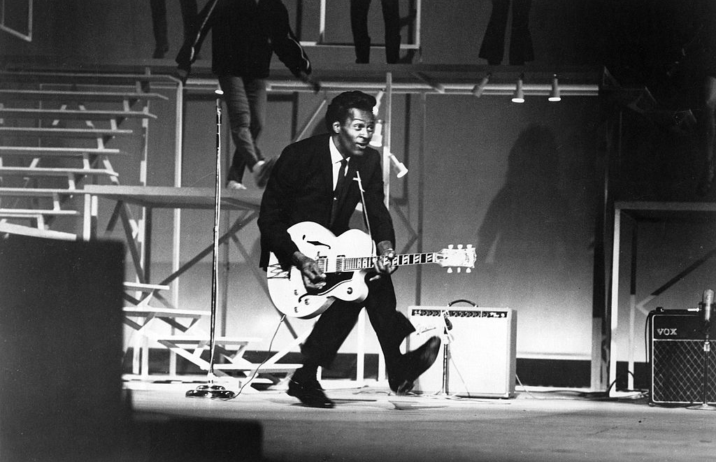 Chuck Berry crouching down 