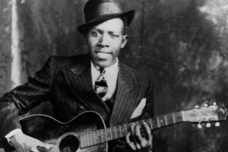Johnson with his guitar 
