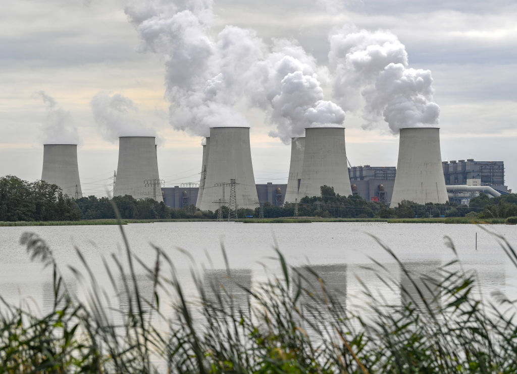 The steaming cooling towers of the Jänschwalde lignite-fired power plant
