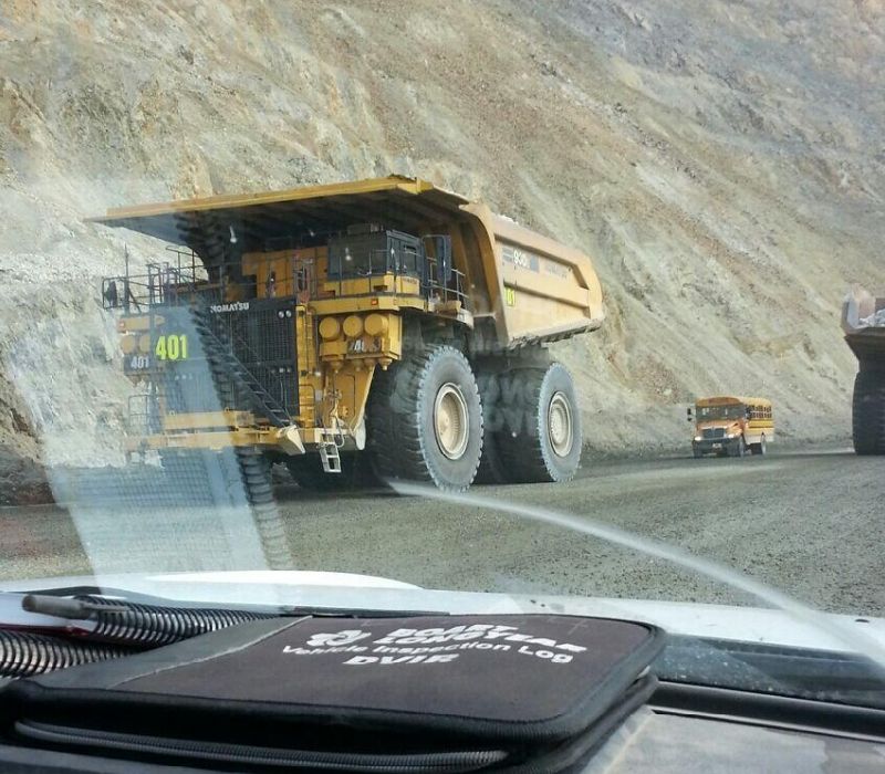 CAT 797F and a school bus