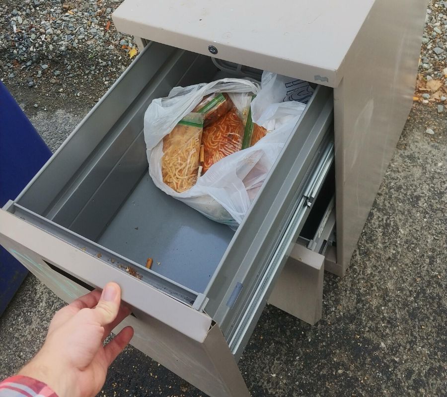 a drawer full of bagged spaghetti 