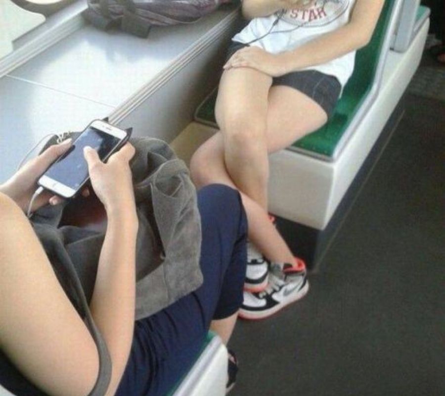 a woman sitting with her legs crossed backwards