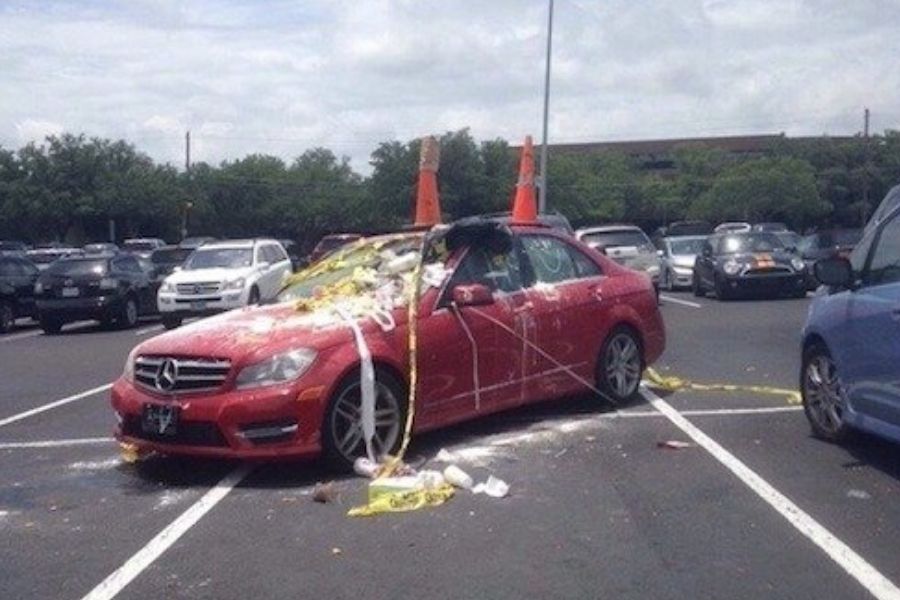 car not parked within the lines