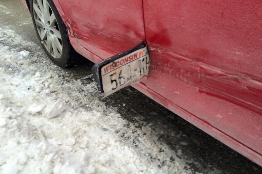 license plate stuck in car