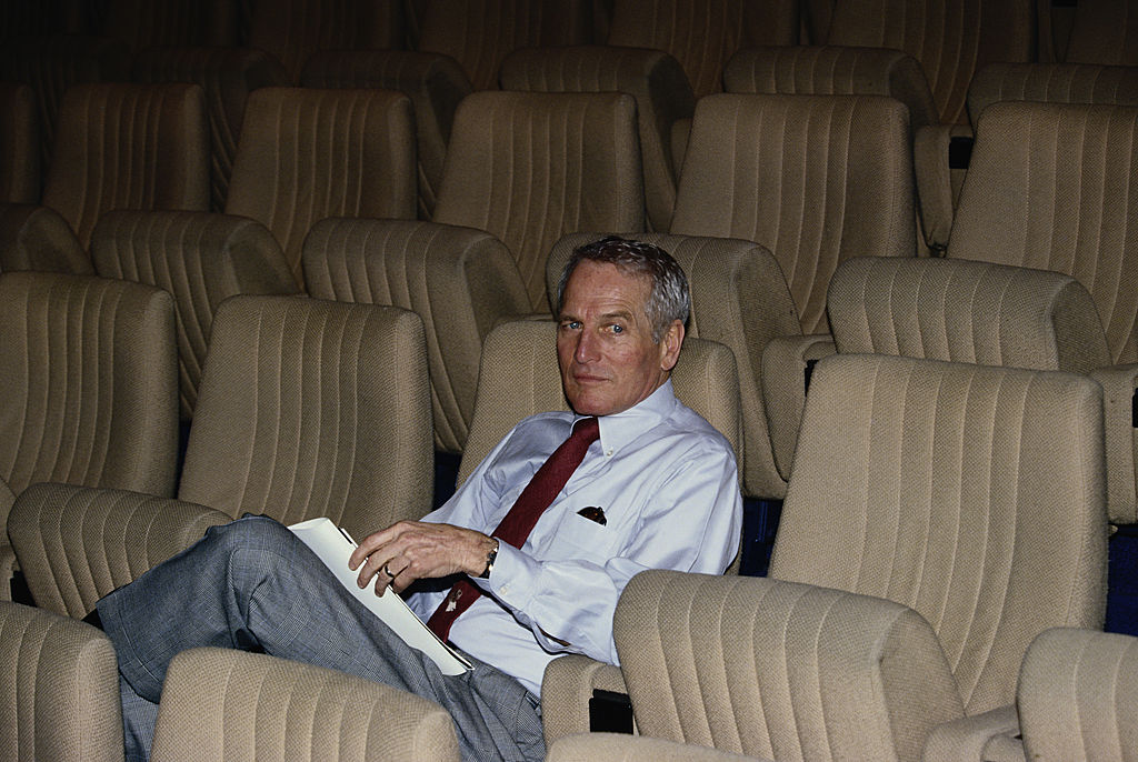 Newman sitting down in the UK 