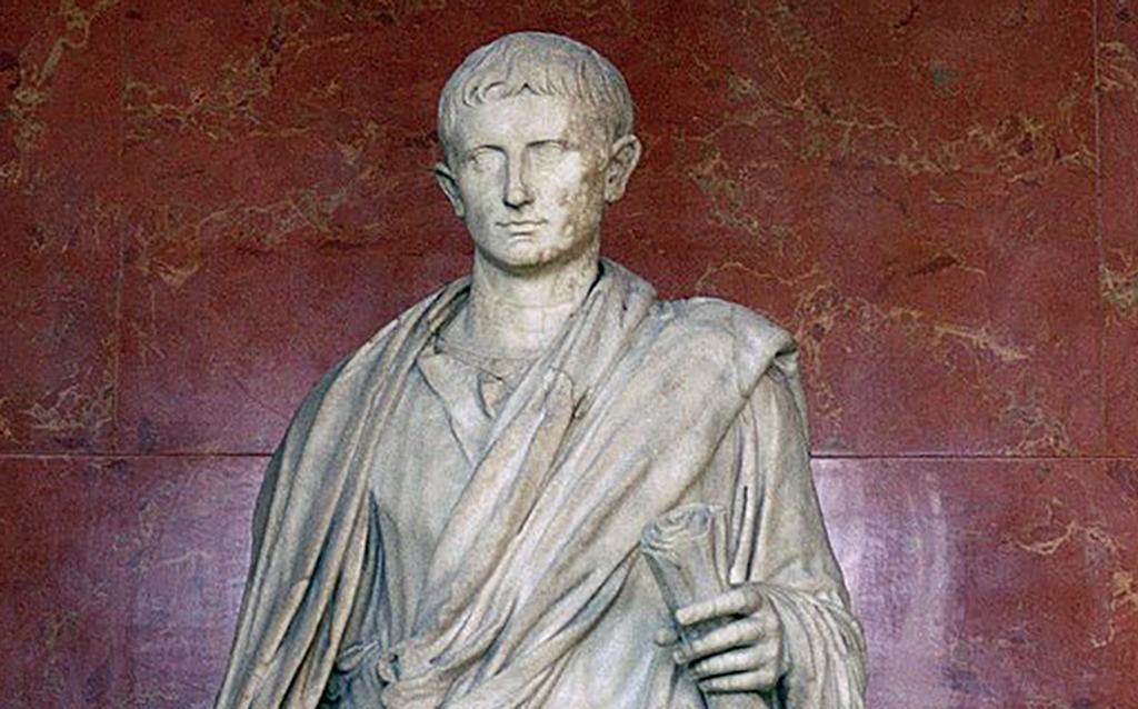 Bust of Augustus in front of red wall 