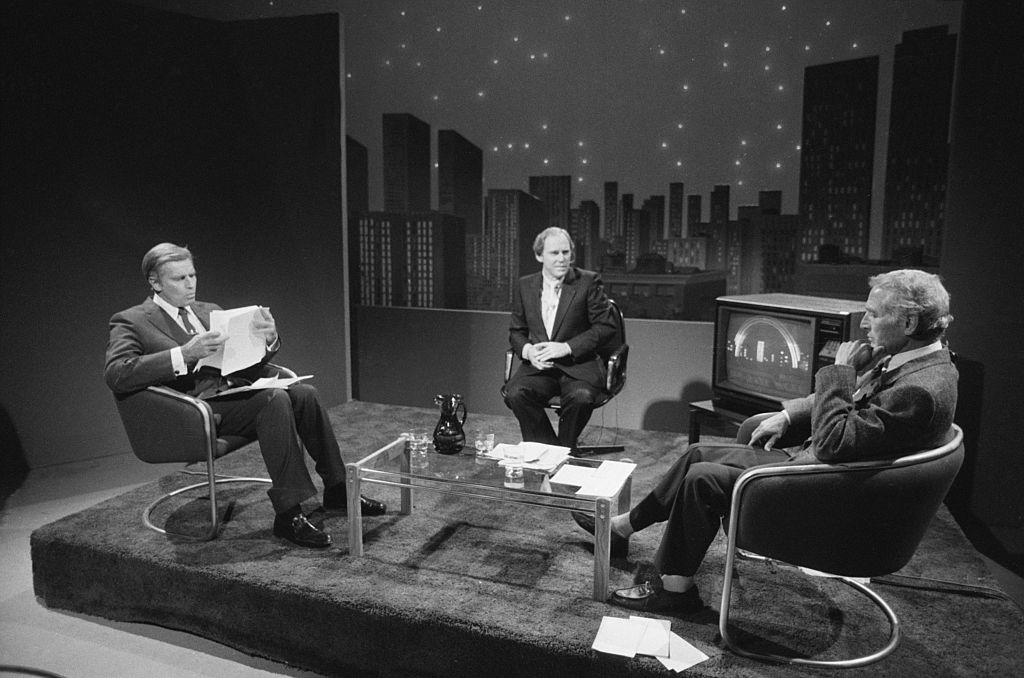 Newman and Heston TV debate 