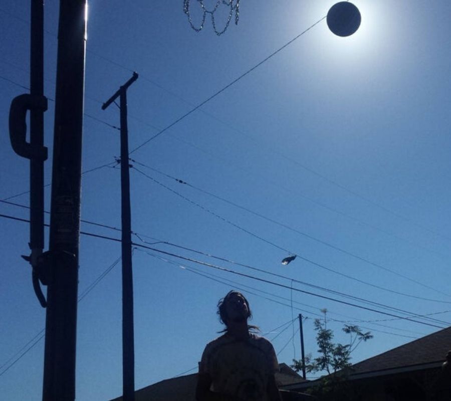 basketball a basketball perfectly placed over the sun