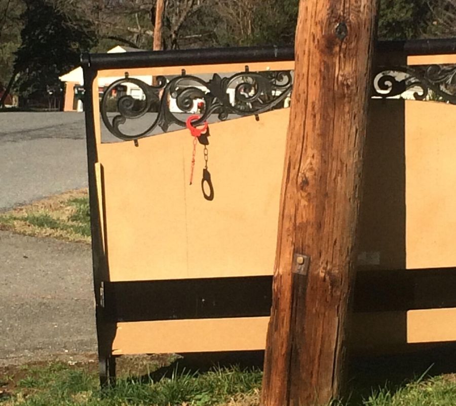 people put a headboard out at the street with handcuffs on them