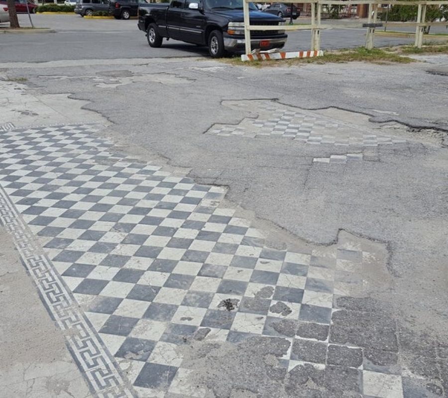 a parking lot that was paved where a building used to be
