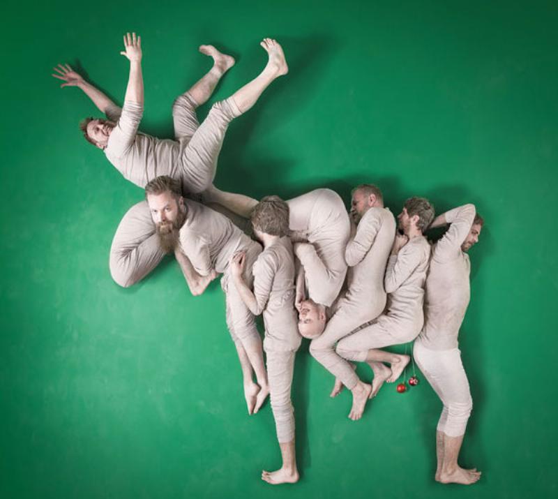 reindeer people shape bodies into a reindeer
