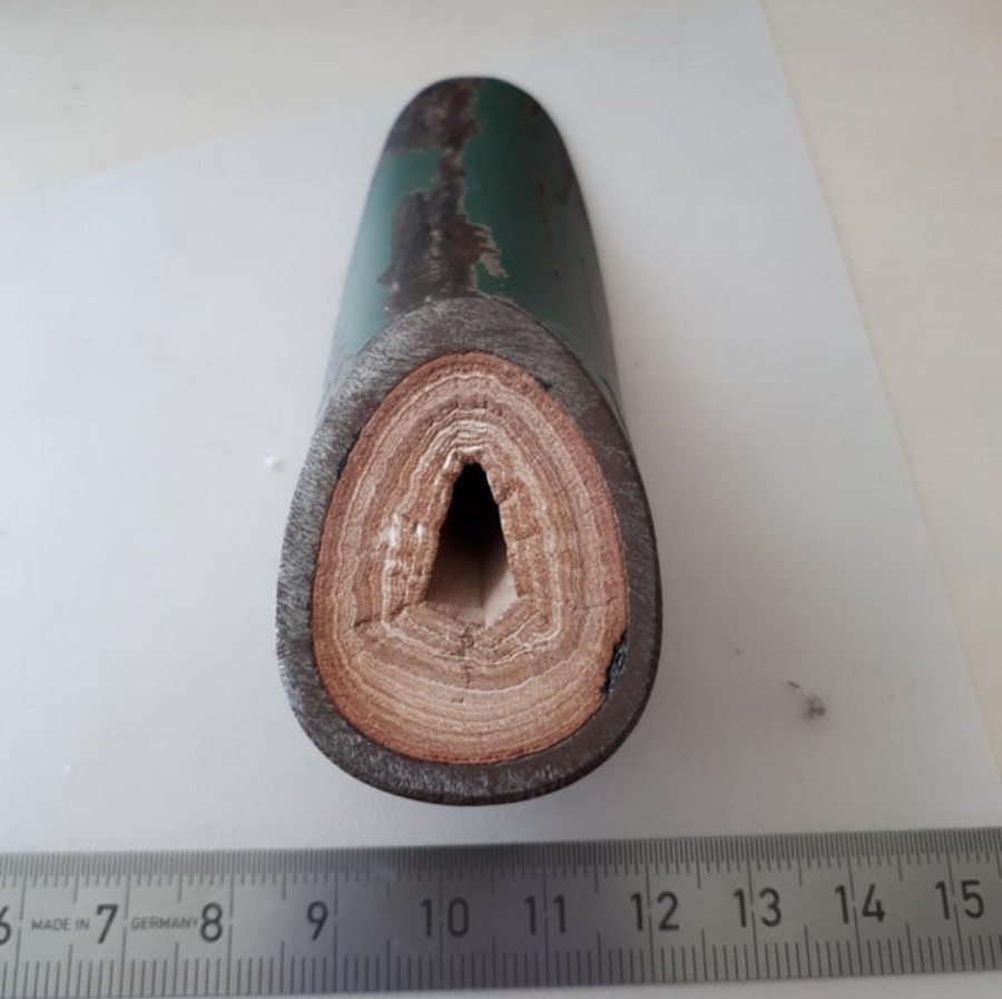 pipe with layers of limescale