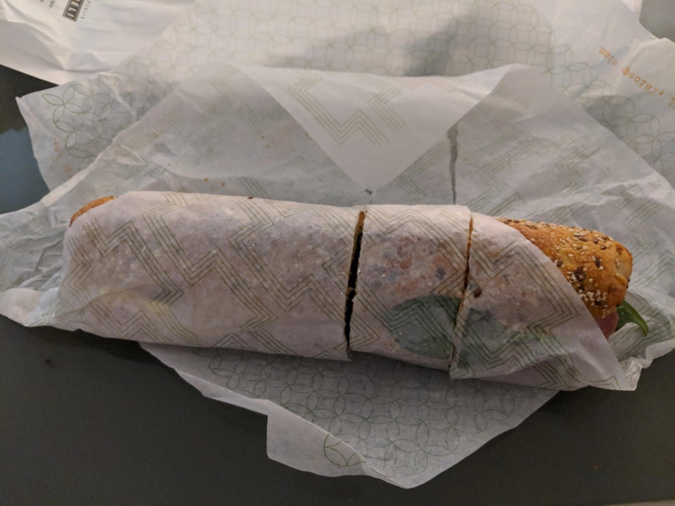 footlong sub cut in three uneven piece