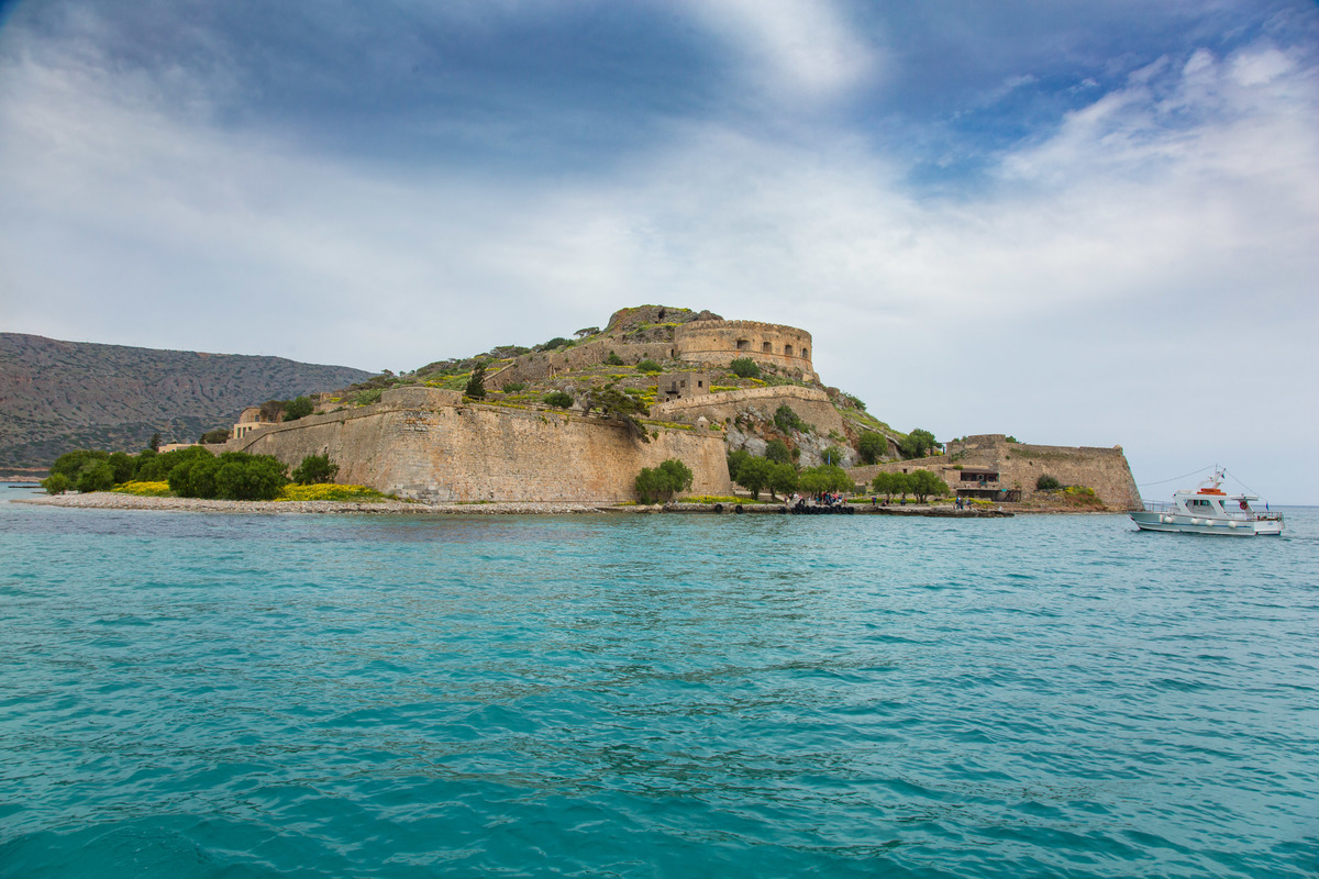 Spinalonga, an abandoned leper colony in Crete island, is seen from the sea.