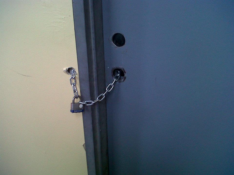door lock door locked with chain and lock