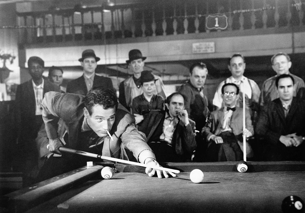 Newman playing pool 