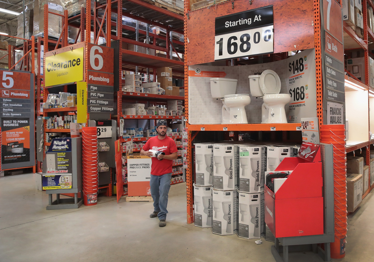 A customer stands by the clearance aisle at Home Depot.