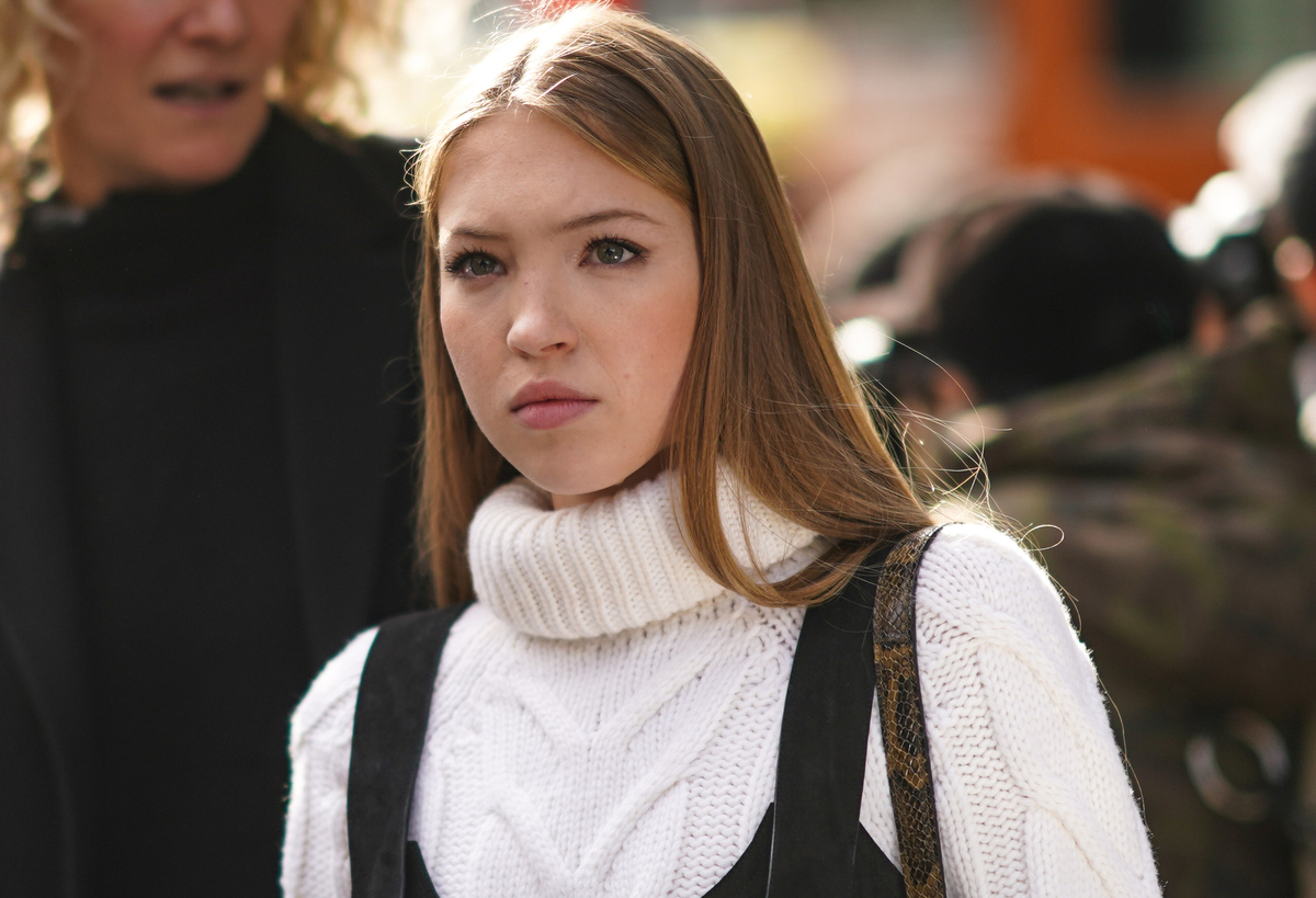 white turtleneck - 1204952972 Lila Moss, daughter of Kate Moss, wears a white wool knitted turtleneck.