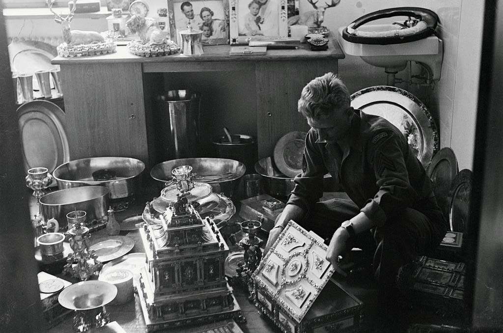 Man looking through collection 